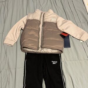 Reebok Tan and Brown Puffer Vest with Black Pants
